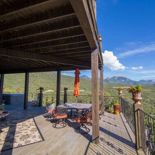 deck at Cedar Bedn Lodge looking at La Sal Mountains